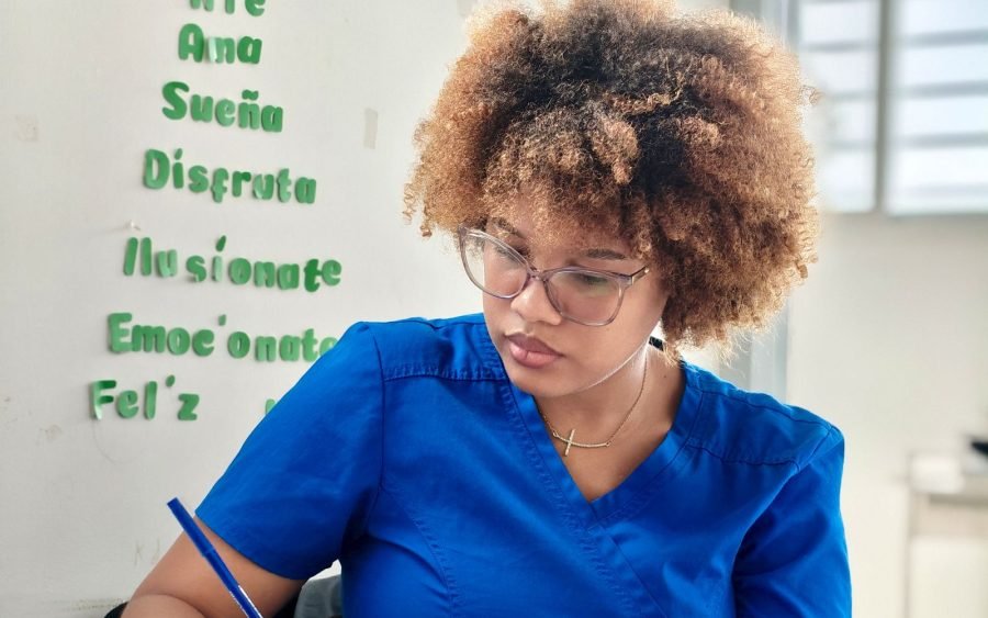 Nurse completing documentation and billing notes in a home health setting